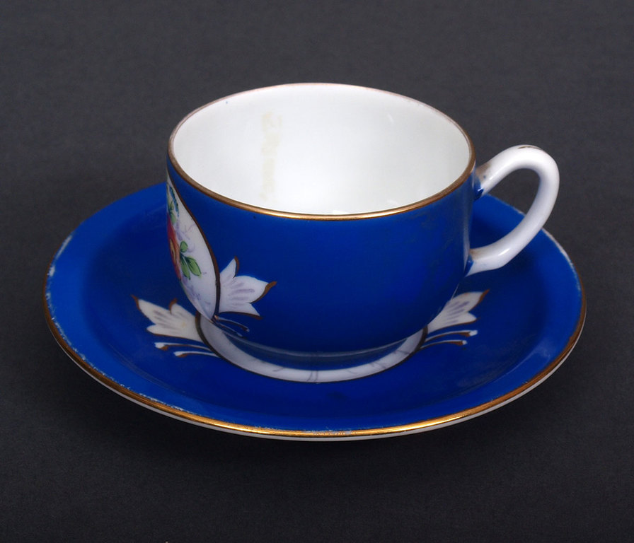 Porcelain cup with the saucer