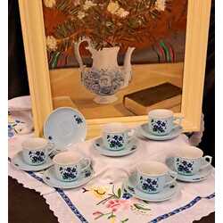 Gentle, elegant, breakfast tea-coffee service with spring violets