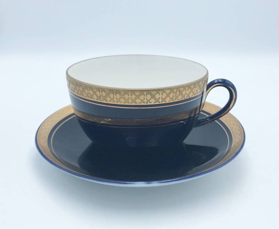 Porcelain cups with saucers (2 pcs.)