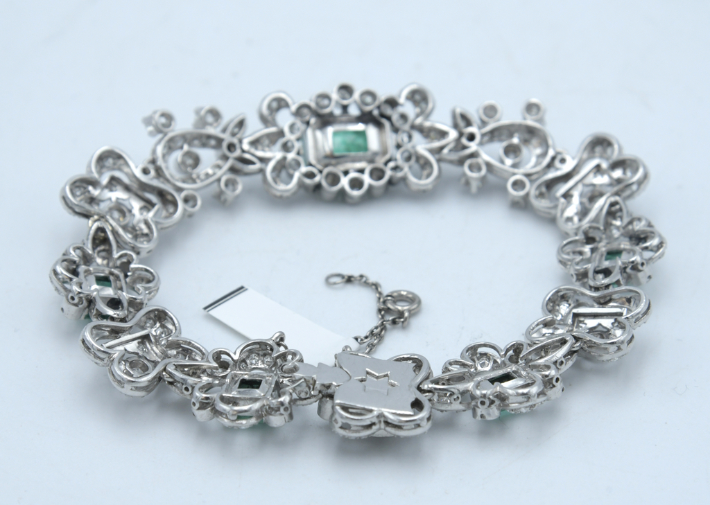 Platinum bracelet with diamonds and emeralds