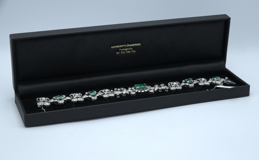 Platinum bracelet with diamonds and emeralds