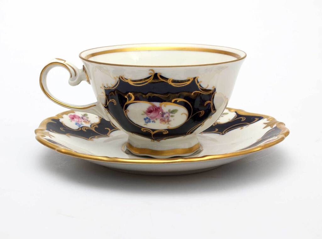 Porcelain cup with saucer