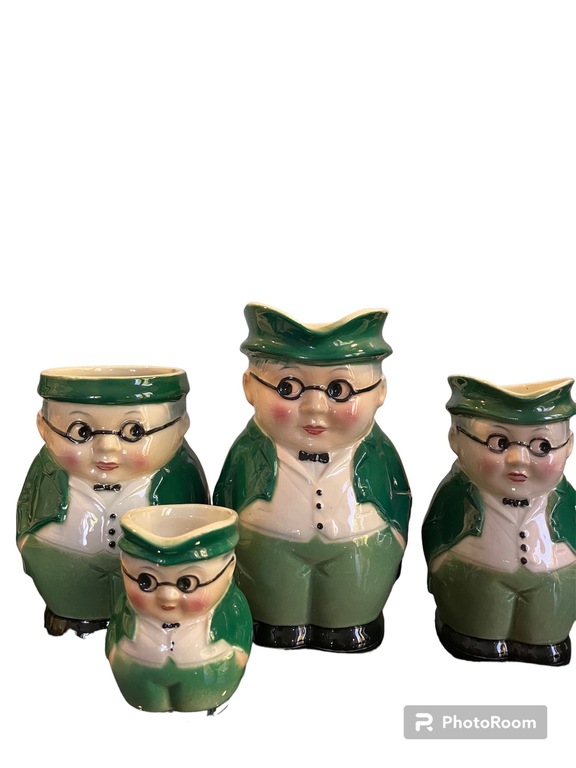 collection of porcelain jugs the bespectacled man in the green jacket MR Pickwik. made in Germany by Goebel