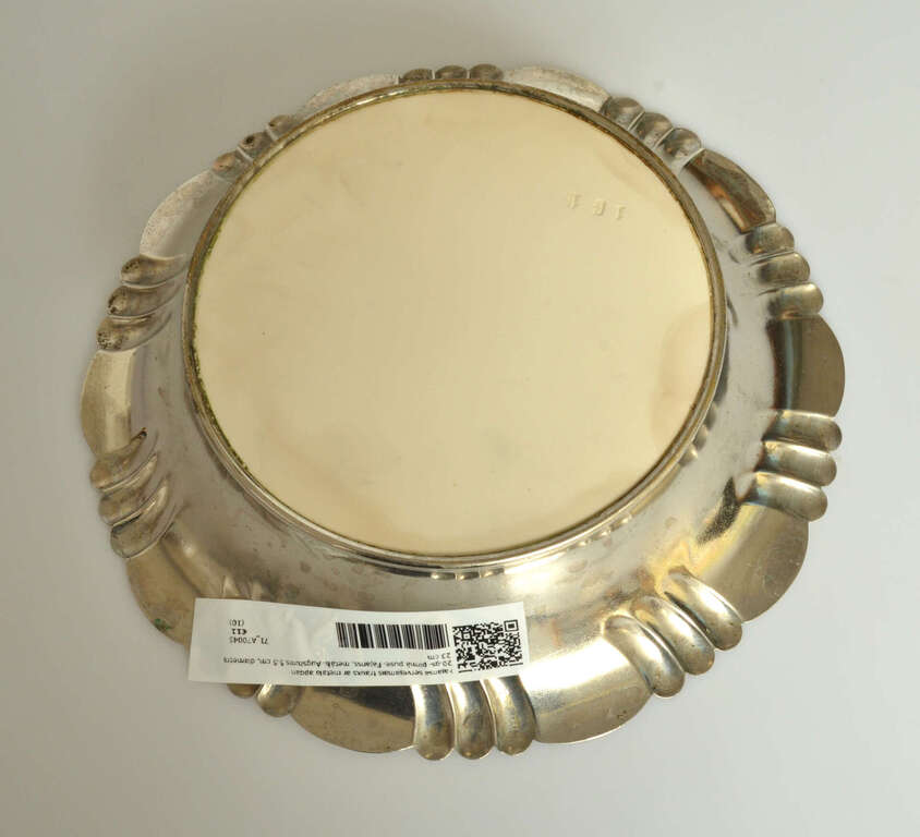 Faience serving dish with metal finish