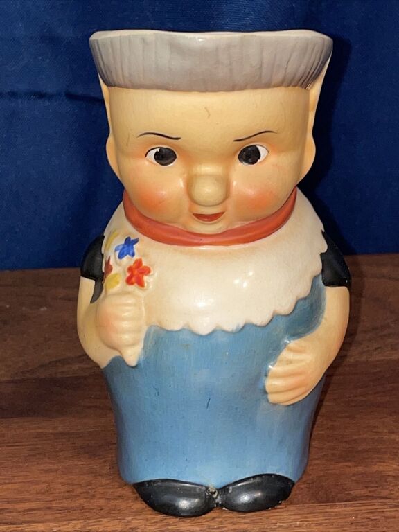 collectible porcelain jug Boy with flowers