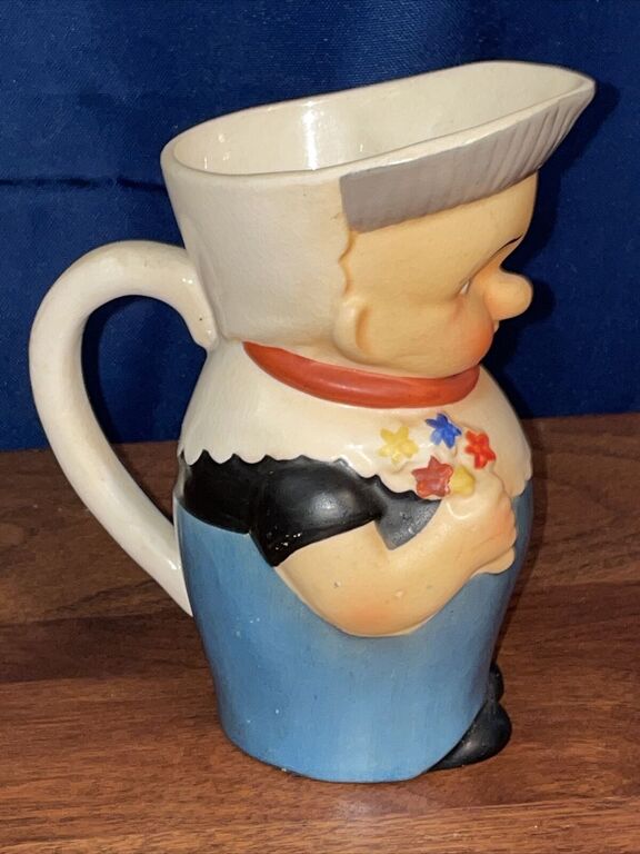 collectible porcelain jug Boy with flowers