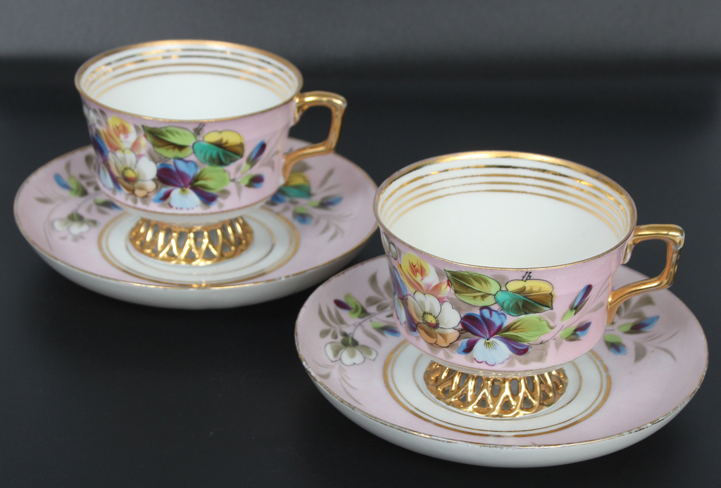 Two porcelain cups with saucers (2 pcs.)