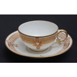 Hand painted porcelain cup with saucer