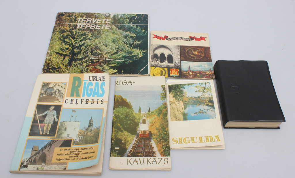 5 books/booklets and 1 set of postcards