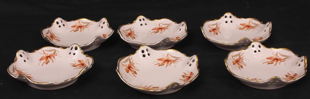 Painted porcelain serving plates (7 pcs.)