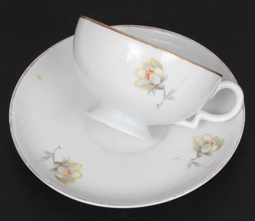 Porcelain cup with saucer