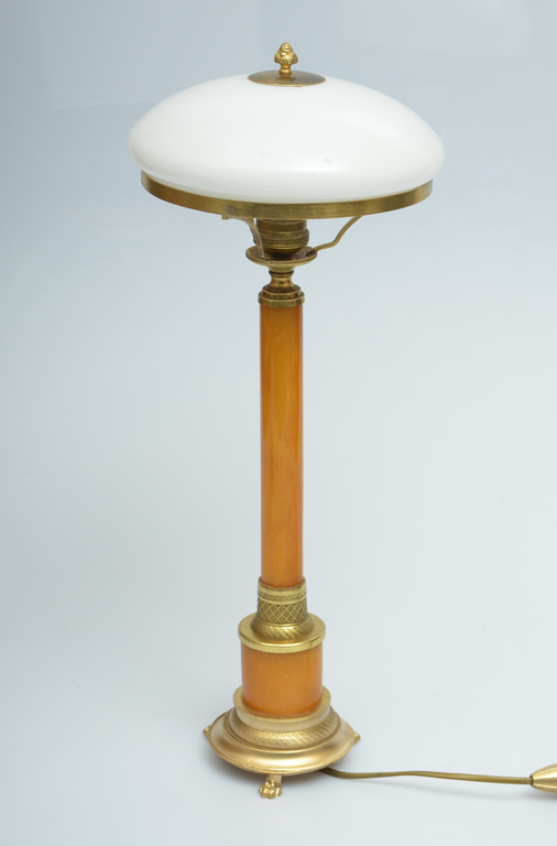 Bronze lamp with pressed amber