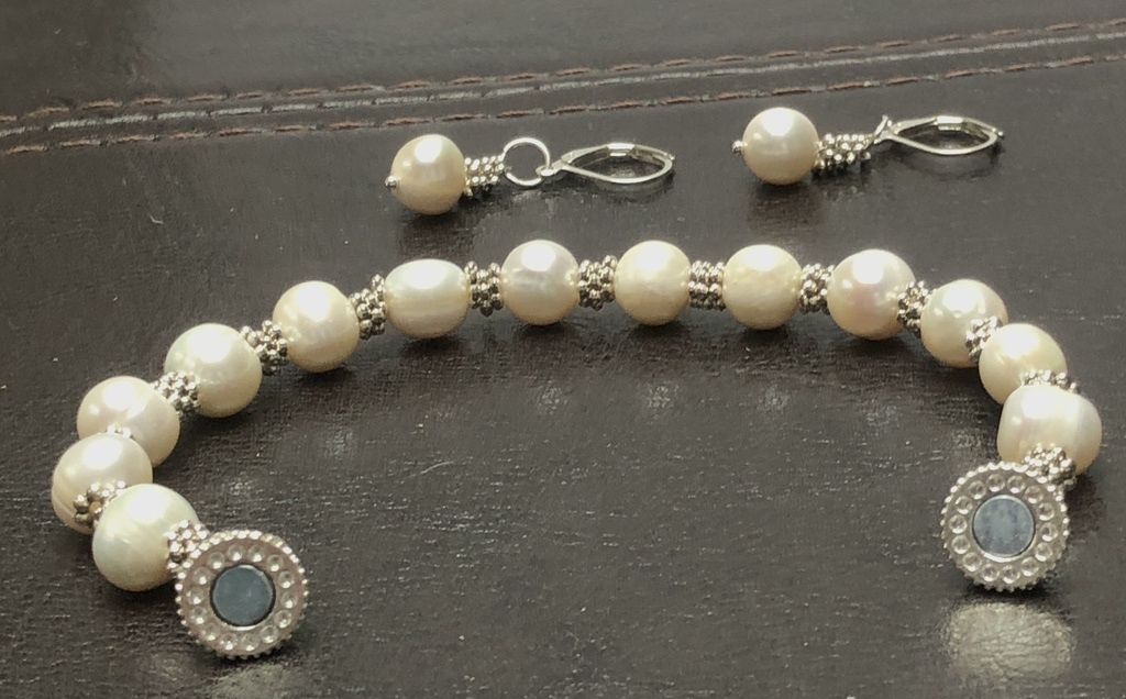 White freshwater pearl bracelet with earrings.