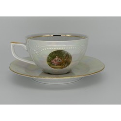 Porcelain cup with saucer.