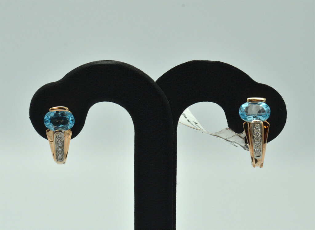 Gold earrings with diamonds and topazes