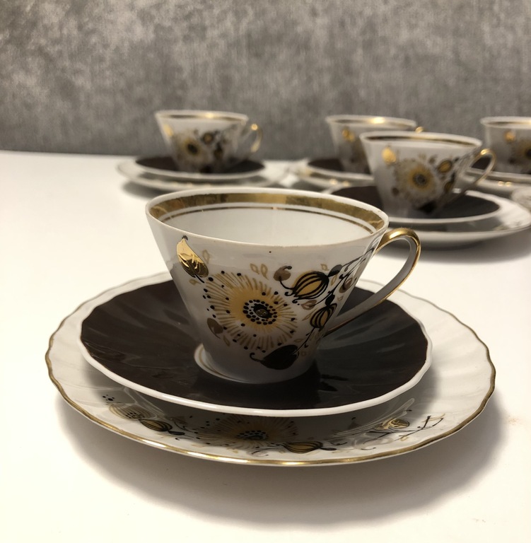 Five thin-walled porcelain trios (extra saucer and plate) from 