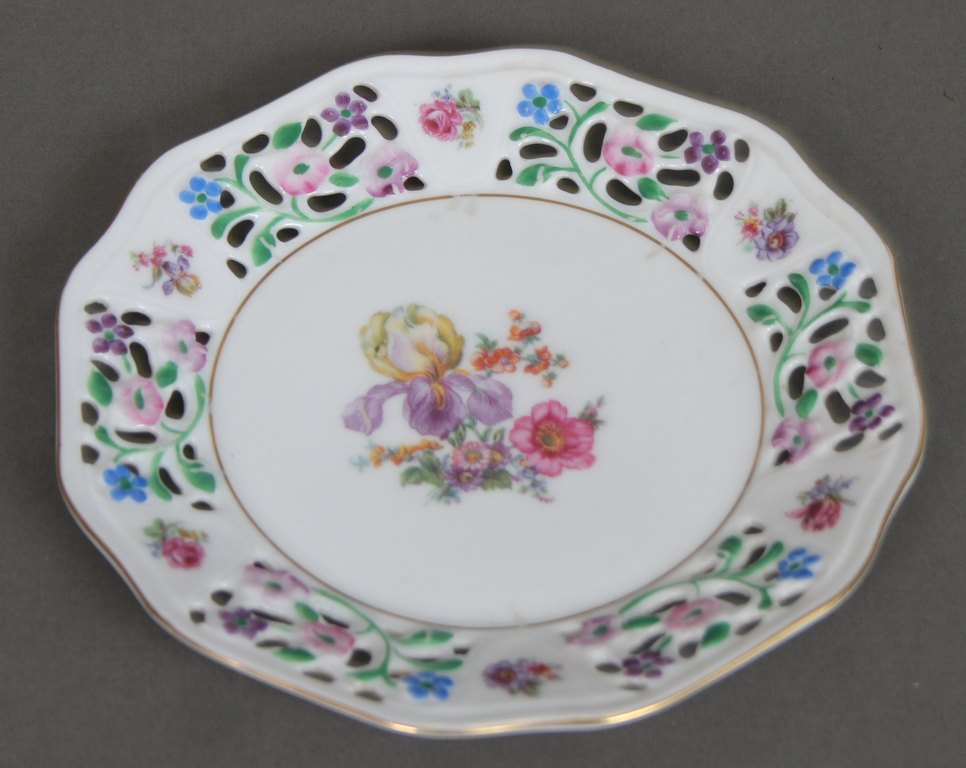 Set of different porcelain plates (9 pcs.)