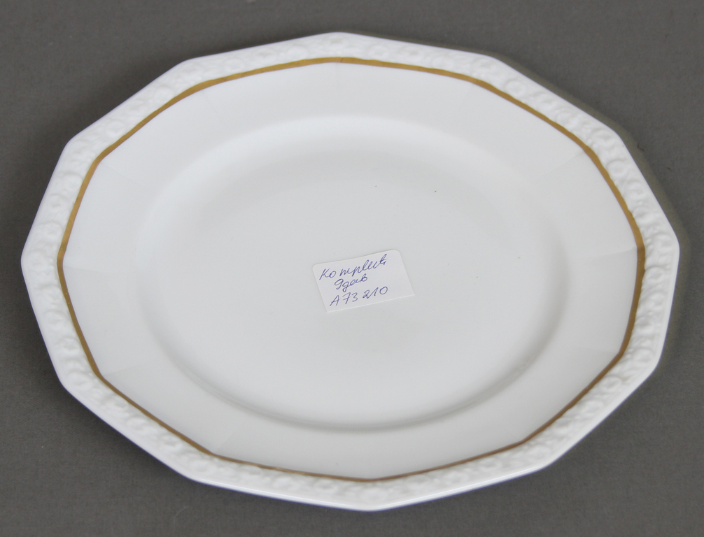 Set of different porcelain plates (9 pcs.)