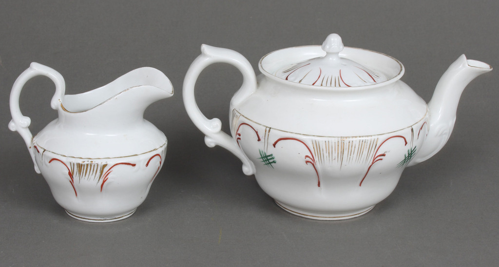 Porcelain teapot and creamer