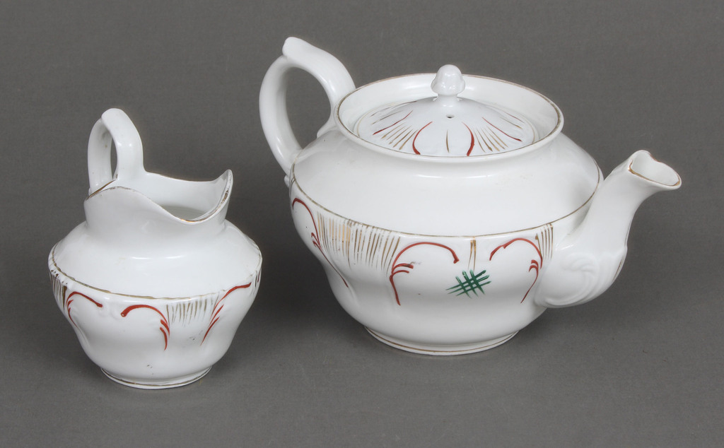 Porcelain teapot and creamer