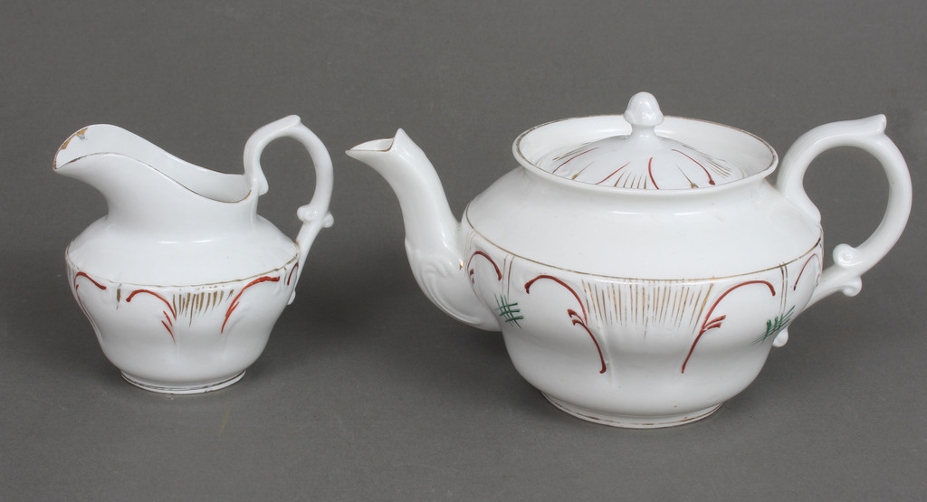 Porcelain teapot and creamer