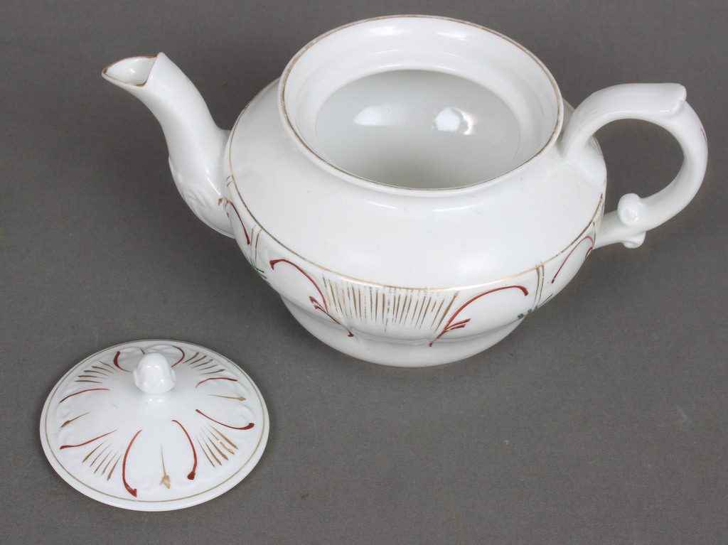 Porcelain teapot and creamer