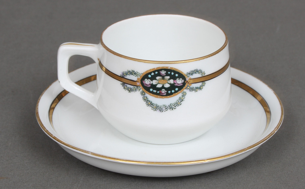 Porcelain cup with saucer