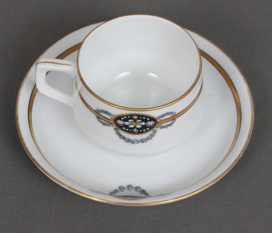 Porcelain cup with saucer