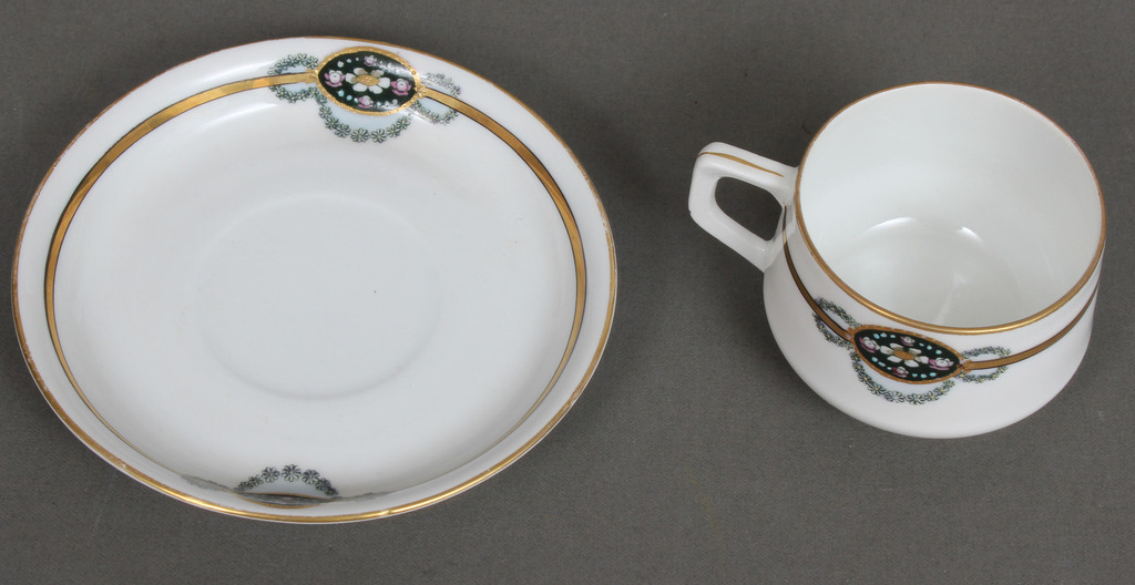 Porcelain cup with saucer