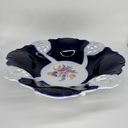 Large porcelain fruit plate with claw feet.Cobalt and slotted porcelain.Hand painted Rose Garden