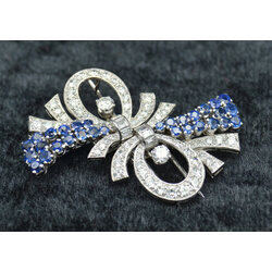 White gold brooch with diamonds and sapphires