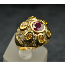 Gold ring with diamonds and ruby