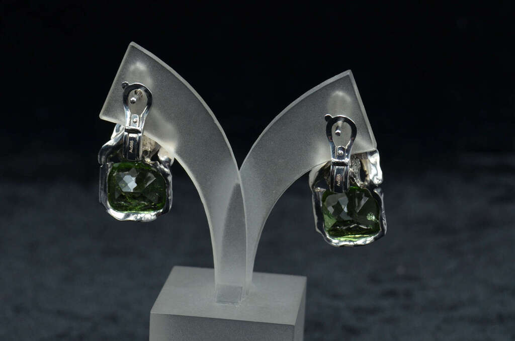 White gold ring and earrings with tourmalines and emeralds
