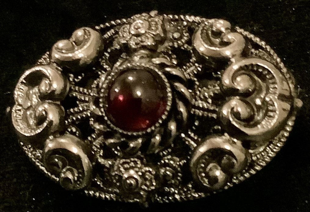 Antique German brooch for national costume with garnet. Filigree. Last century. Excellent state of preservation