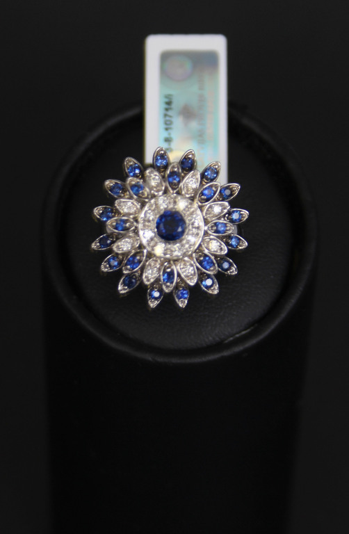 White gold ring and earrings with brilliants and sapphires