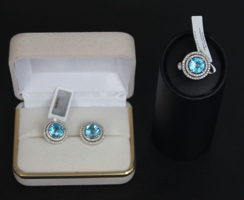 White gold ring and earrings with diamonds and topazes