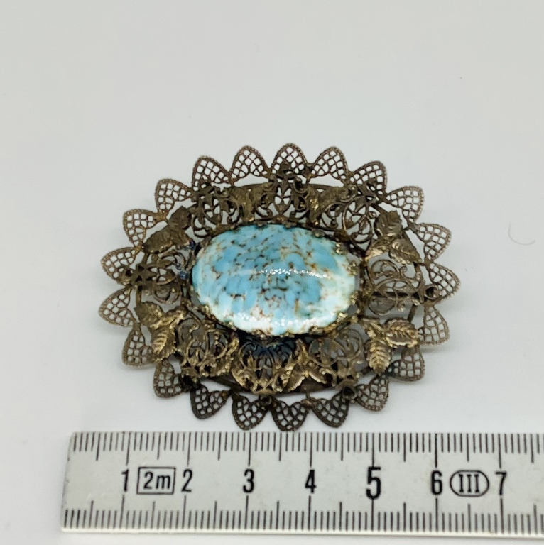 Antique, large brooch with turquoise. Filigree weaving. Silver?