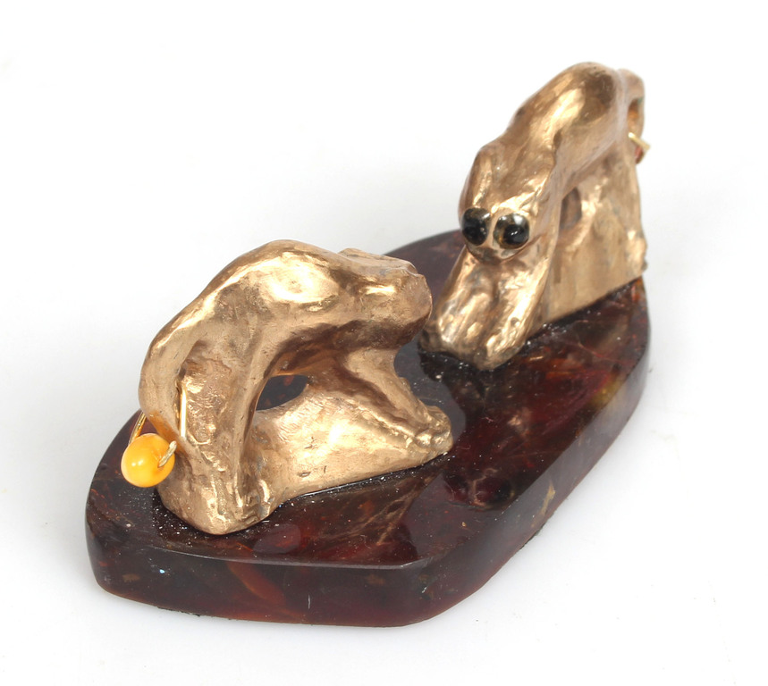Bronze figure on an amber base