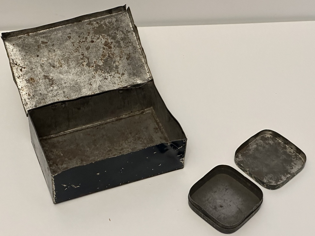 A box for tobacco products and a case for typewriter tape