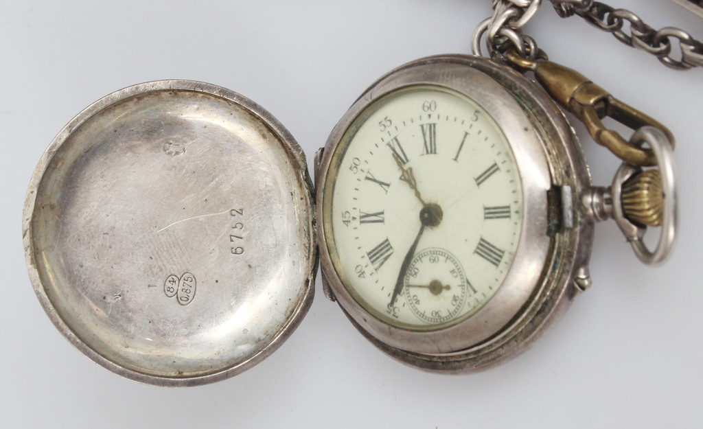 Silver pocket watch with chain