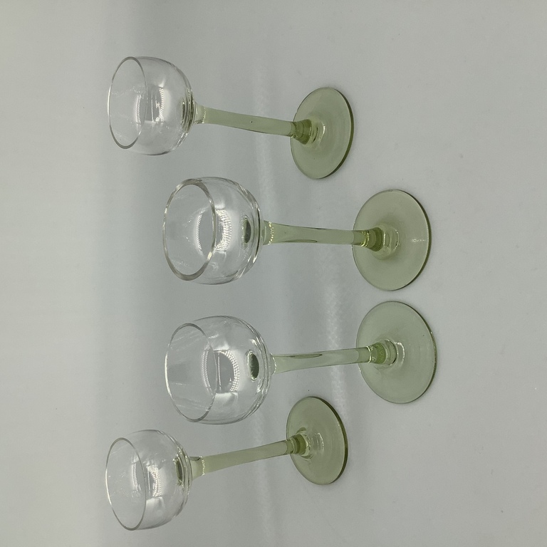 4 pcs Liquor glasses on a long stem, green glass, 20 years Bohemia