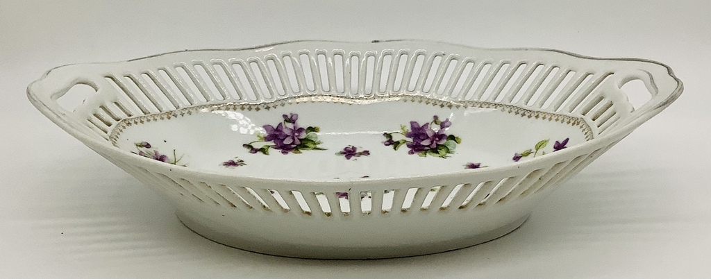 Oval fruit basket made of slotted porcelain. Hand painted. Russia. Beginning of the last century.