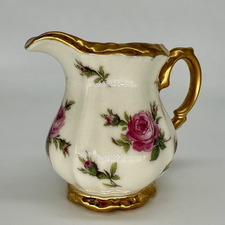 Creamer with decal with drawing. Porcelain ivory series