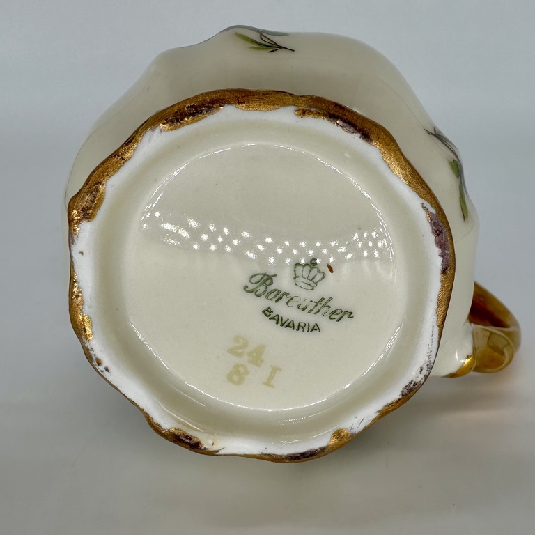 Creamer with decal with drawing. Porcelain ivory series