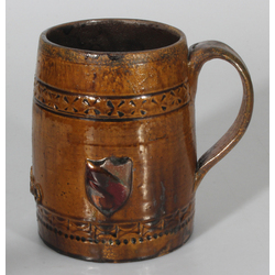 Ceramic beer mug with coat of arms