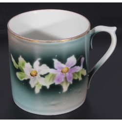 Porcelain mug with gilding 