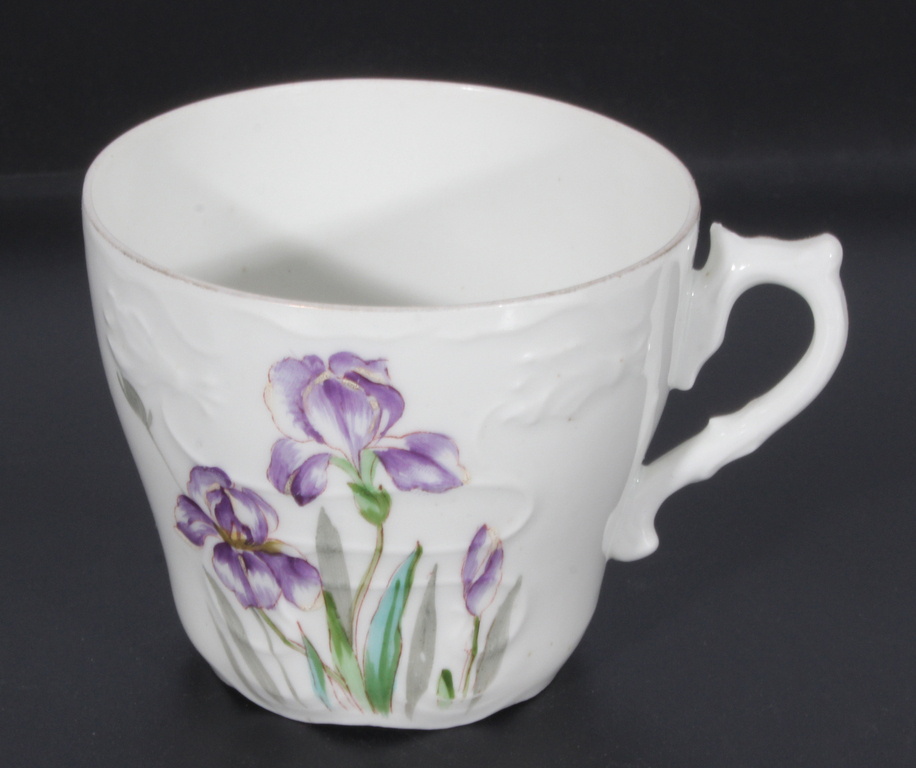 Art Nouveau style cup with saucer