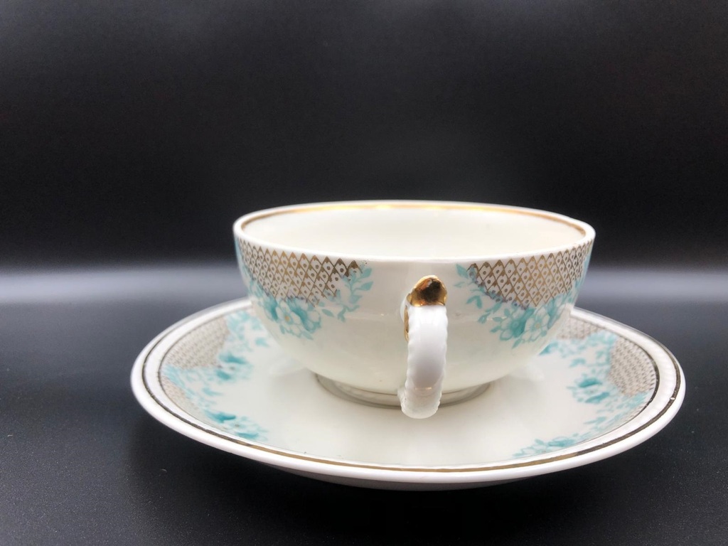 A cup with a saucer from the Laima coffee service