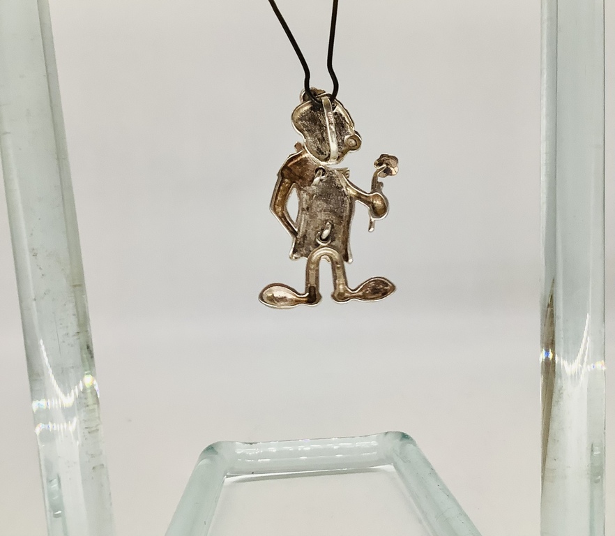 Pendant, Silver. Clown in love. All parts of the body, movable. Last century. France.