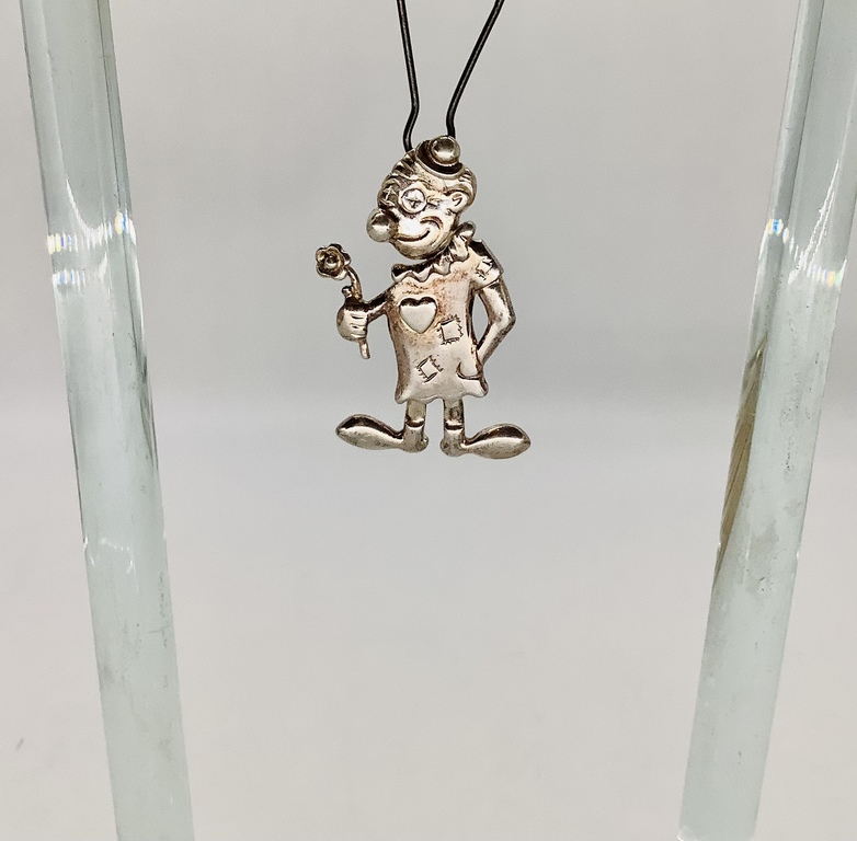 Pendant, Silver. Clown in love. All parts of the body, movable. Last century. France.